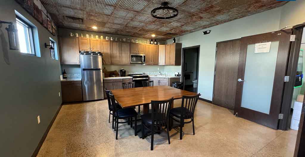 Private table with fridge, stove, sink