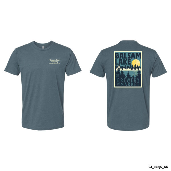 The Indigo Tee W/ Rising Moon features a small "Balsam Lake Brewery Market" logo on the front left chest and a large graphic with the same text, trees, and a moon on the back.