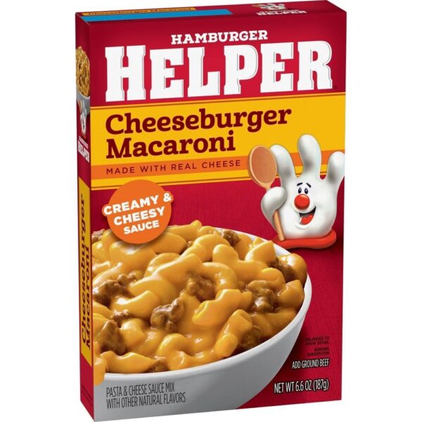 The box of Hamburger Helper Cheeseburger Macaroni displays a bowl of pasta topped with creamy cheese sauce and beef, alongside the iconic Hamburger Helper hand mascot. It contains 6.6 oz (187g).